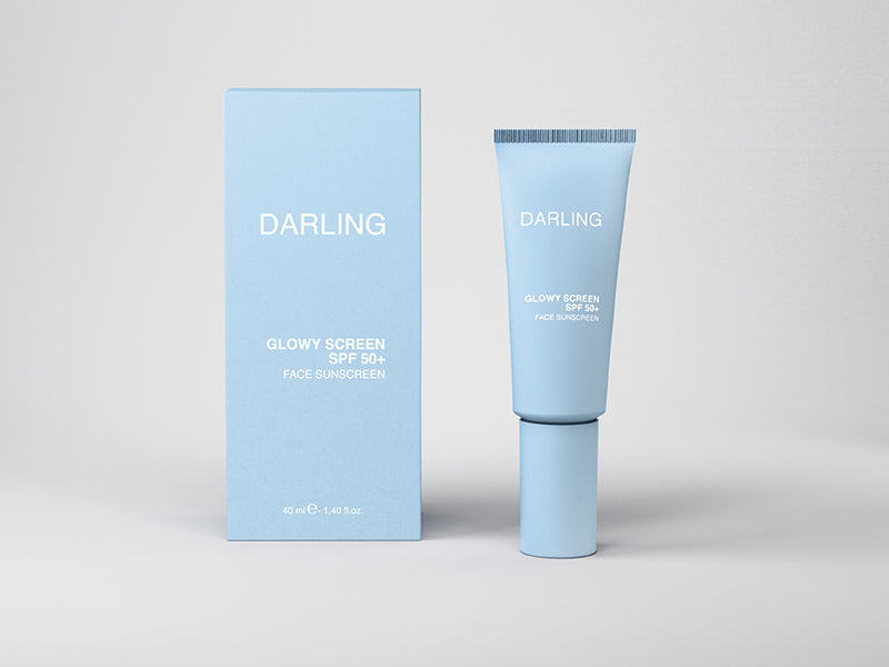 Producto y caja Darling Glowy Screen SPF50+ Protección Solar para el rostro